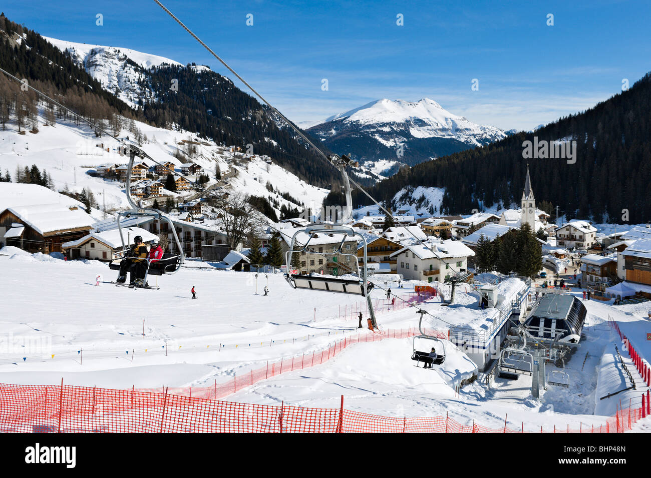 View over the resort of Arabba from the slopes, Sella Ronda Ski Area, Alta Badia, Dolomites, Italy Stock Photo