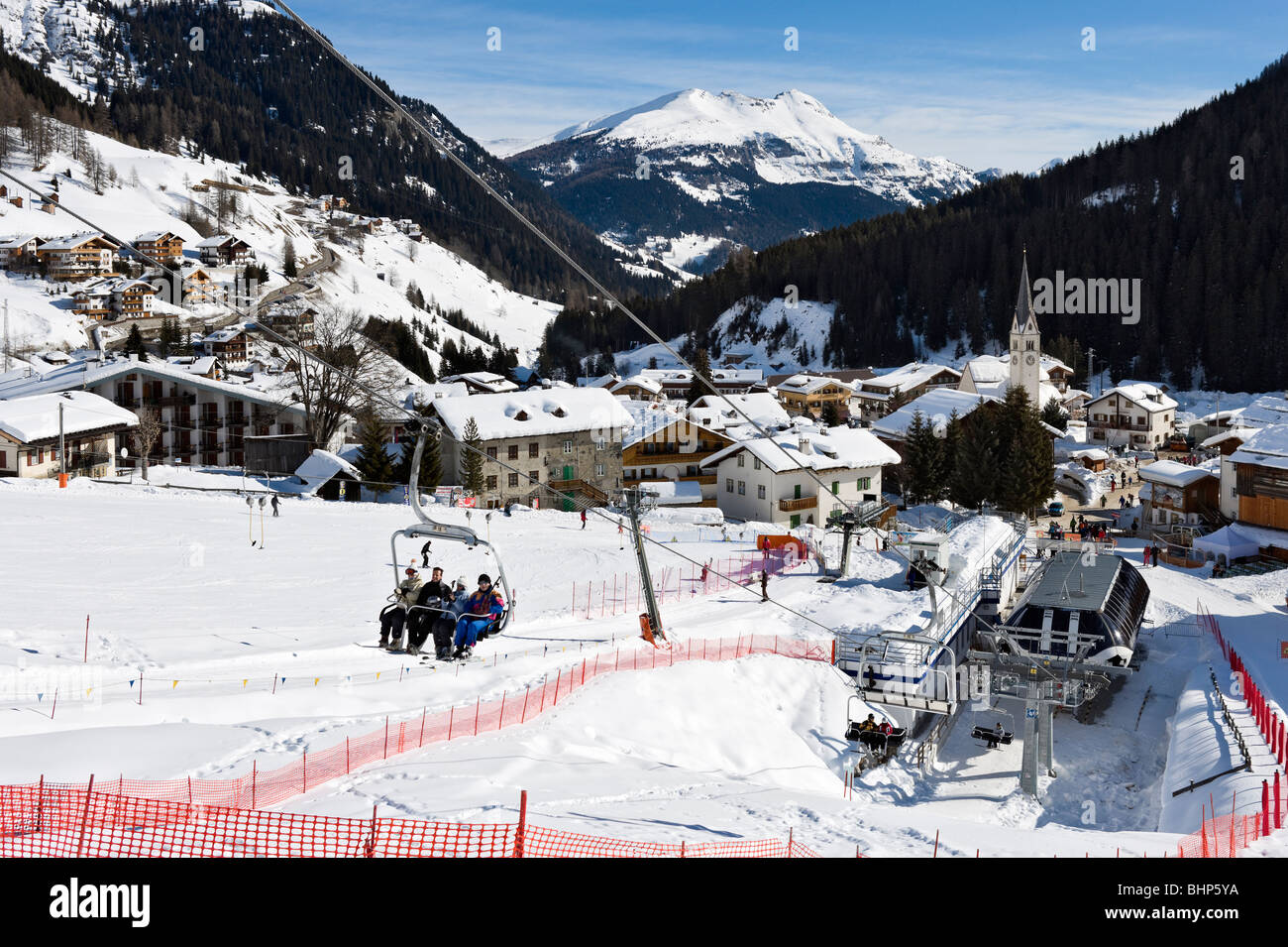 View over the resort of Arabba from the slopes, Sella Ronda Ski Area, Alta Badia, Dolomites, Italy Stock Photo