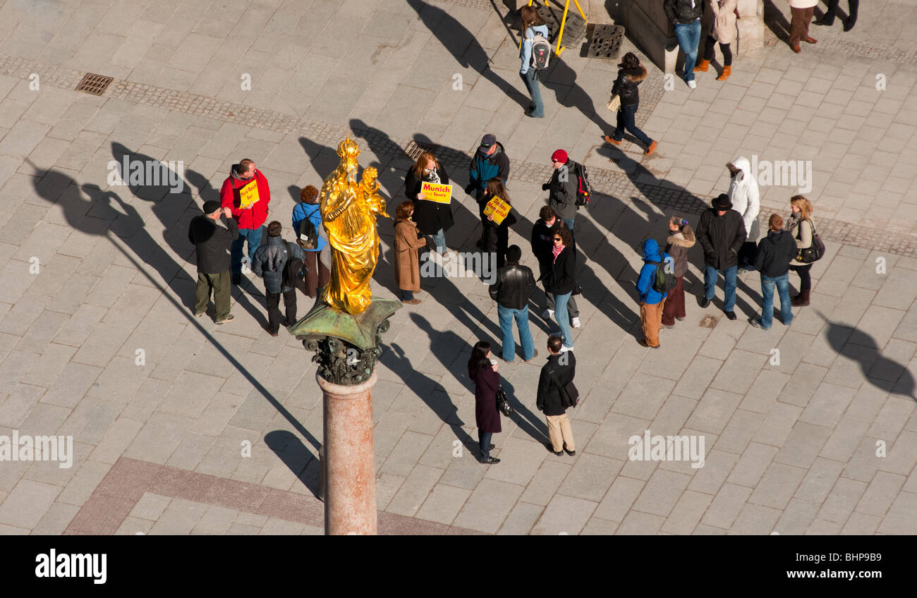Tour guides in Marienplatz, Munich, Germany Stock Photo Alamy
