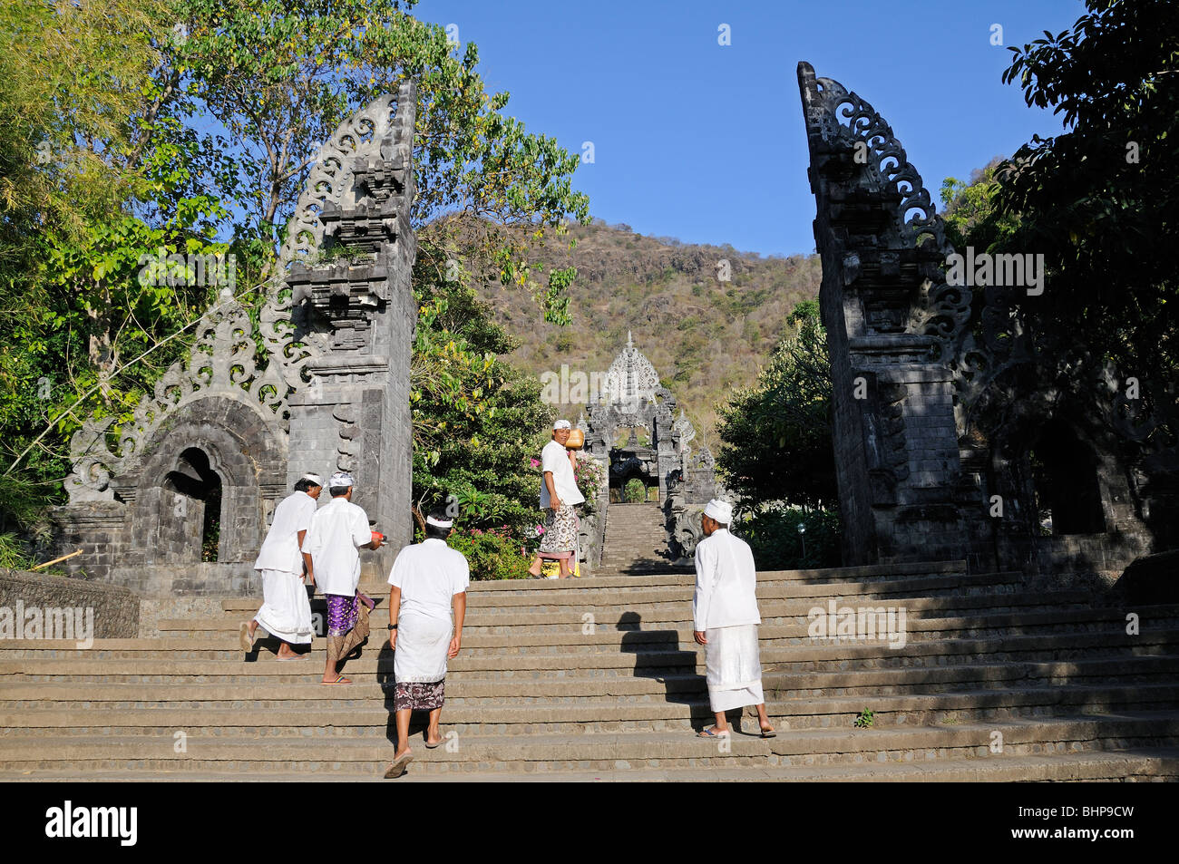 Hindu people walking in Melanting Temple, Pemuteran, Bali, Indonesia Stock Photo