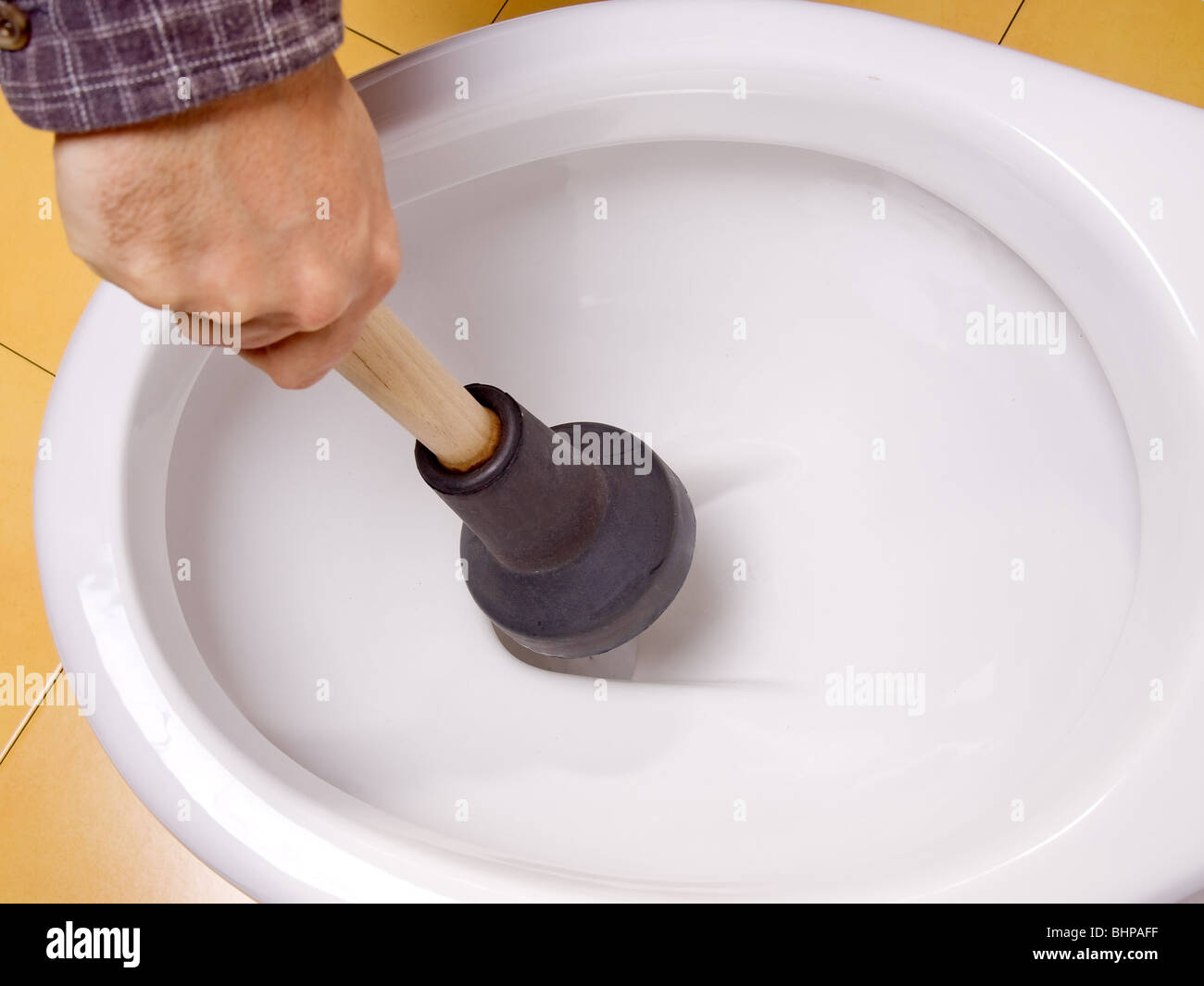cleaning toilet bowl Stock Photo - Alamy