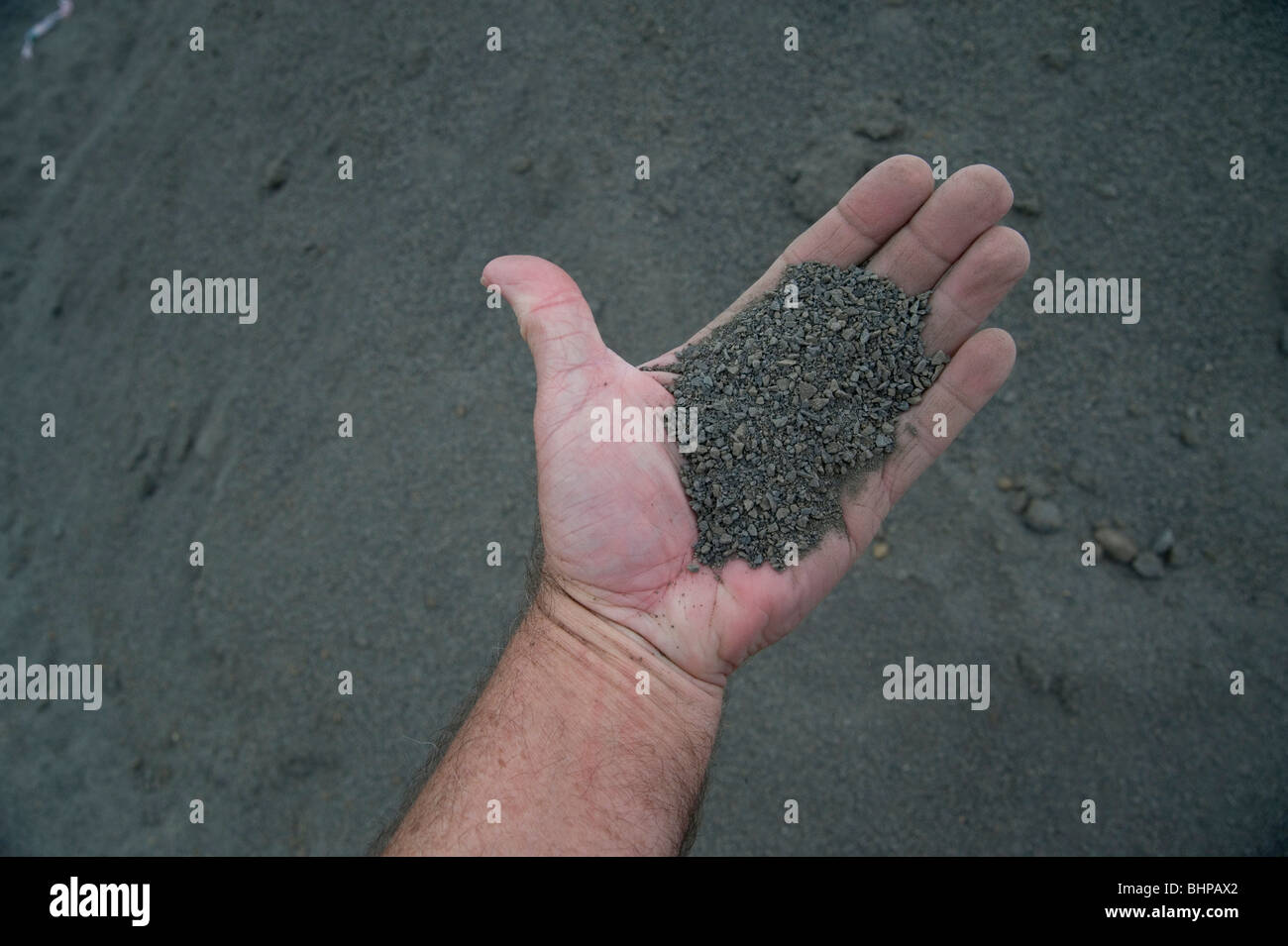 fine gravel, rock dust, crusher dust, in my hand Stock Photo