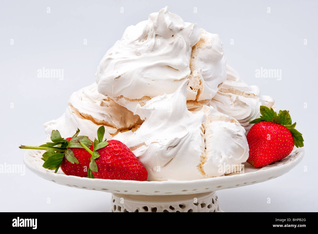 meringues with strawberries Stock Photo Alamy