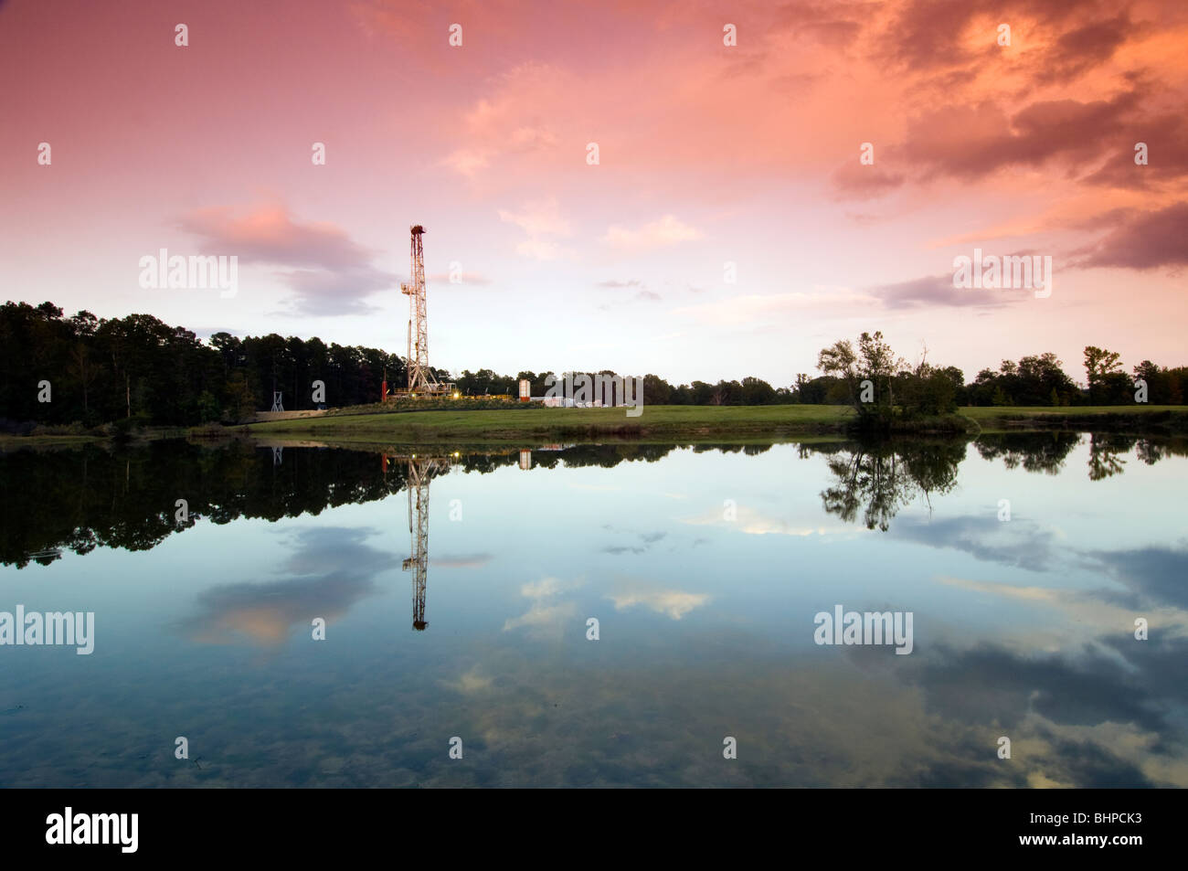 Oil drilling rig with water feflection Stock Photo