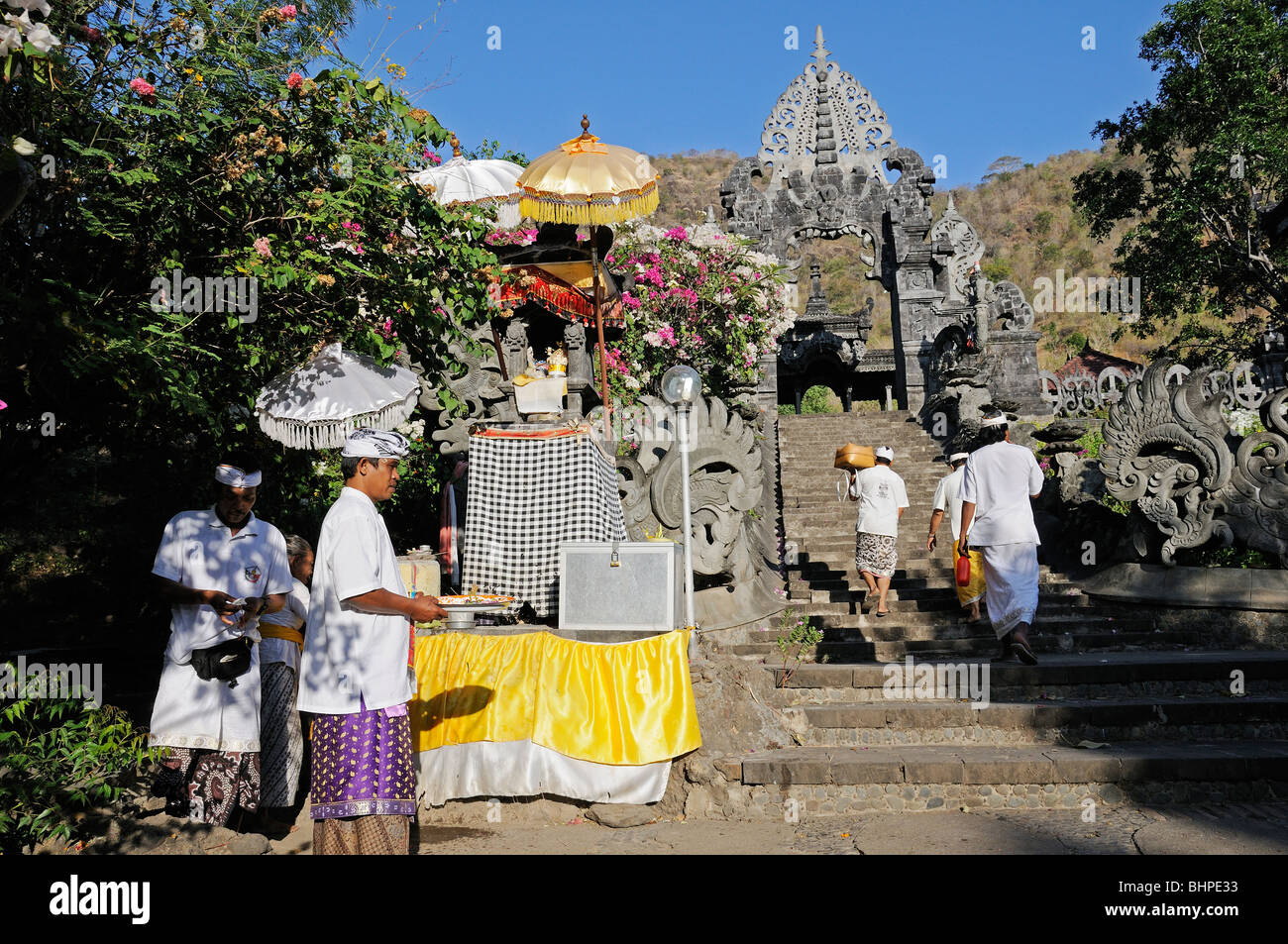 Hindu people walking in Melanting Temple, Pemuteran, Bali, Indonesia Stock Photo