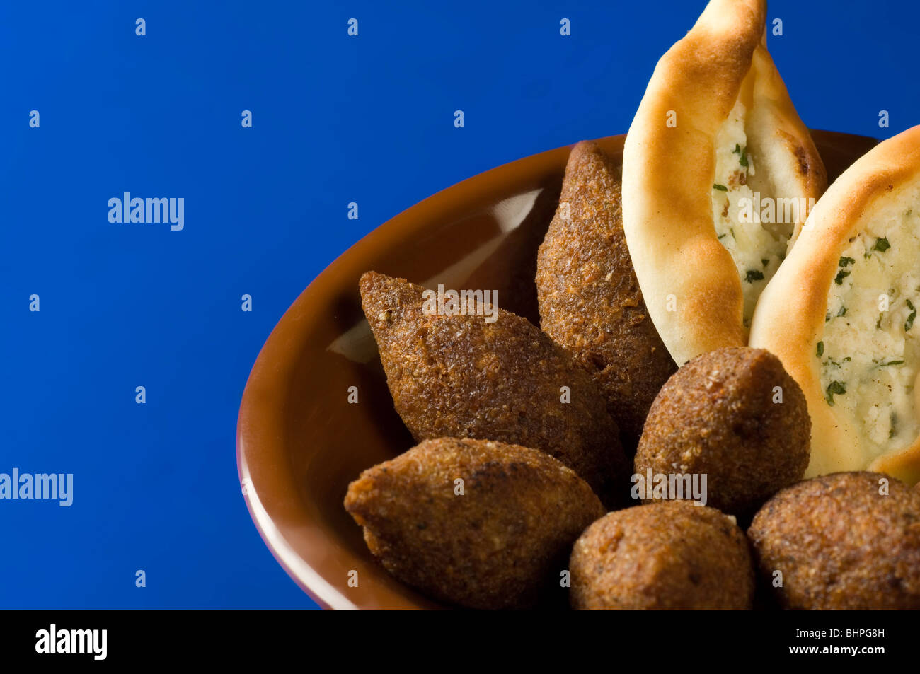 Fried bulgur (kibbeh) stuffed with meat and cheese samosa Beirut