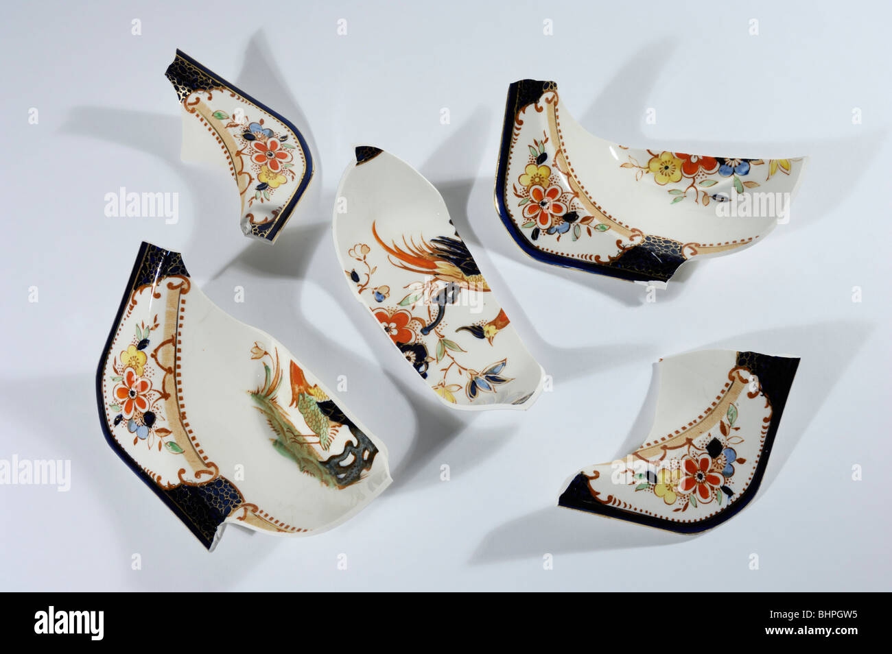 Broken china dishes Stock Photo Alamy