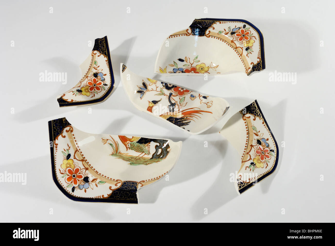 Broken china dishes Stock Photo Alamy