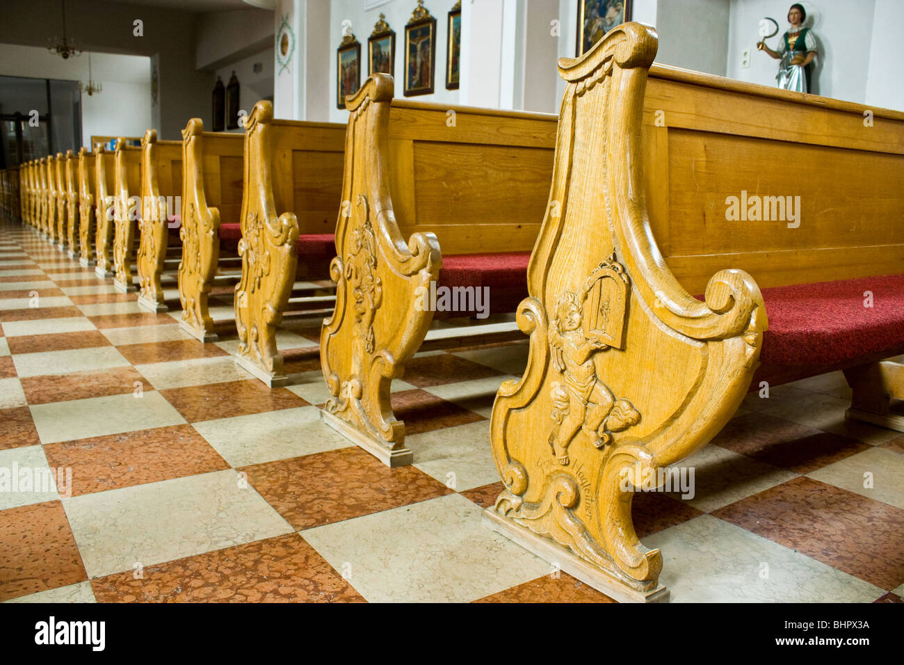 Wooden benches in a church Stock Photo Alamy