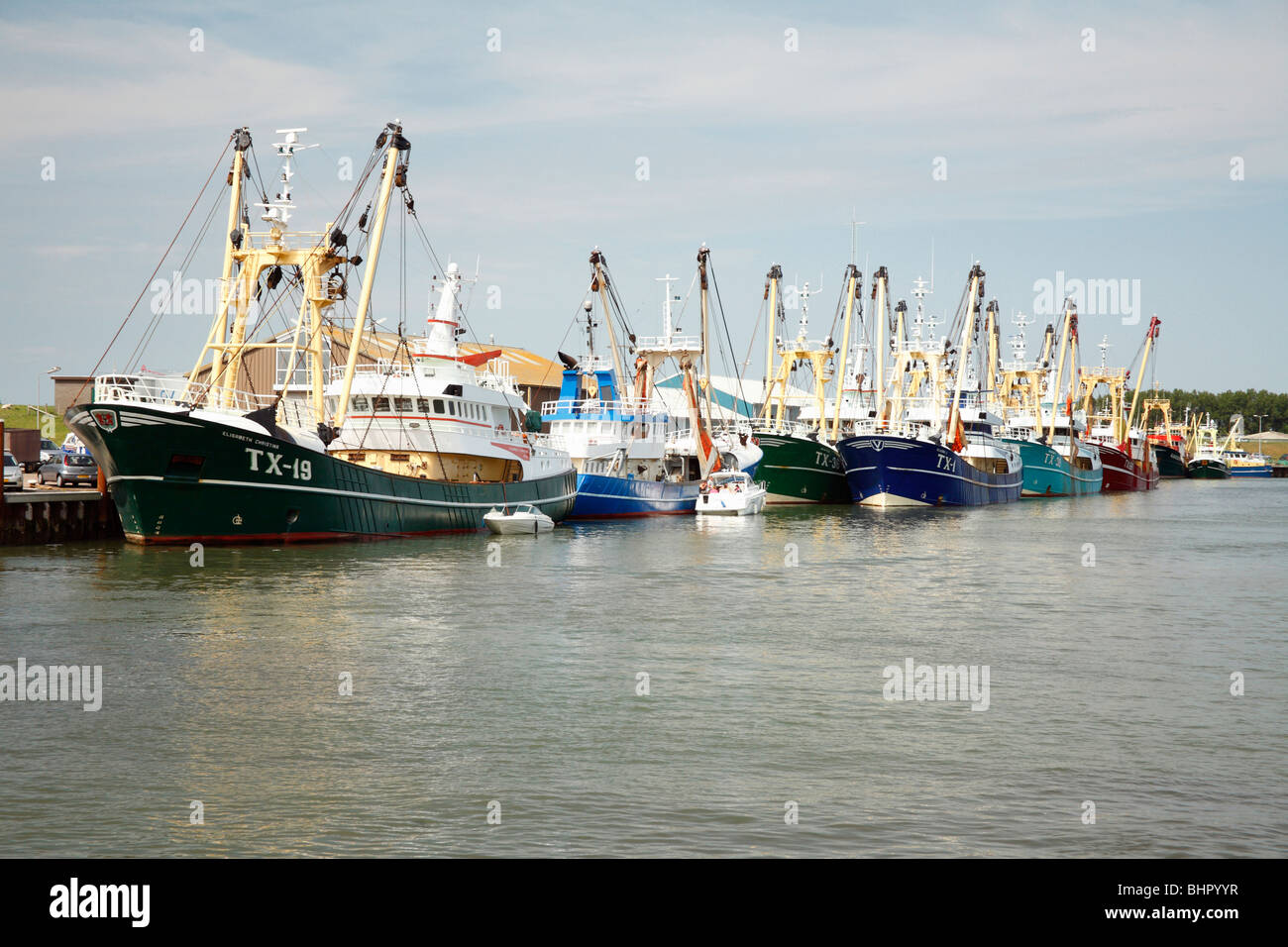 Fishing Fleet - trawler boats at Oudeschild harbour, island of Texel, Holland Stock Photo