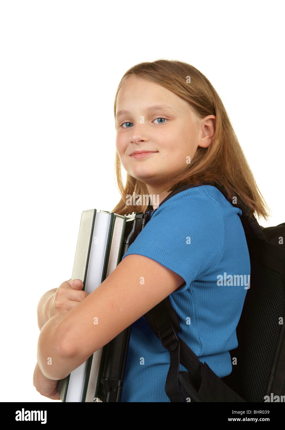 girl ready for school with books and laptop Stock Photo