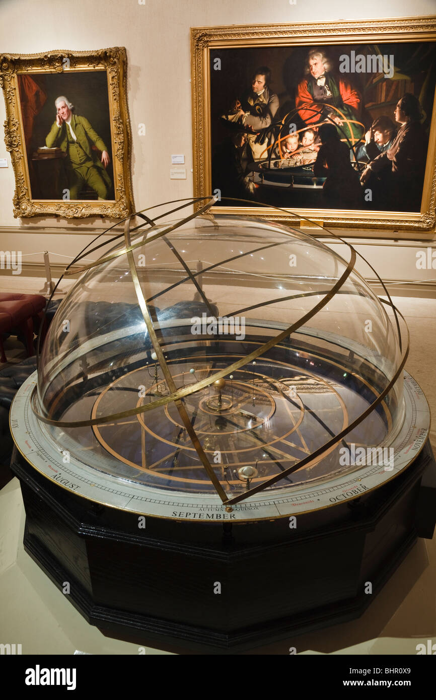 Replica orrery in front of Joseph Wright's painting 'The Orrery', Joseph Wright Gallery, Derby Museum and Art Gallery Stock Photo