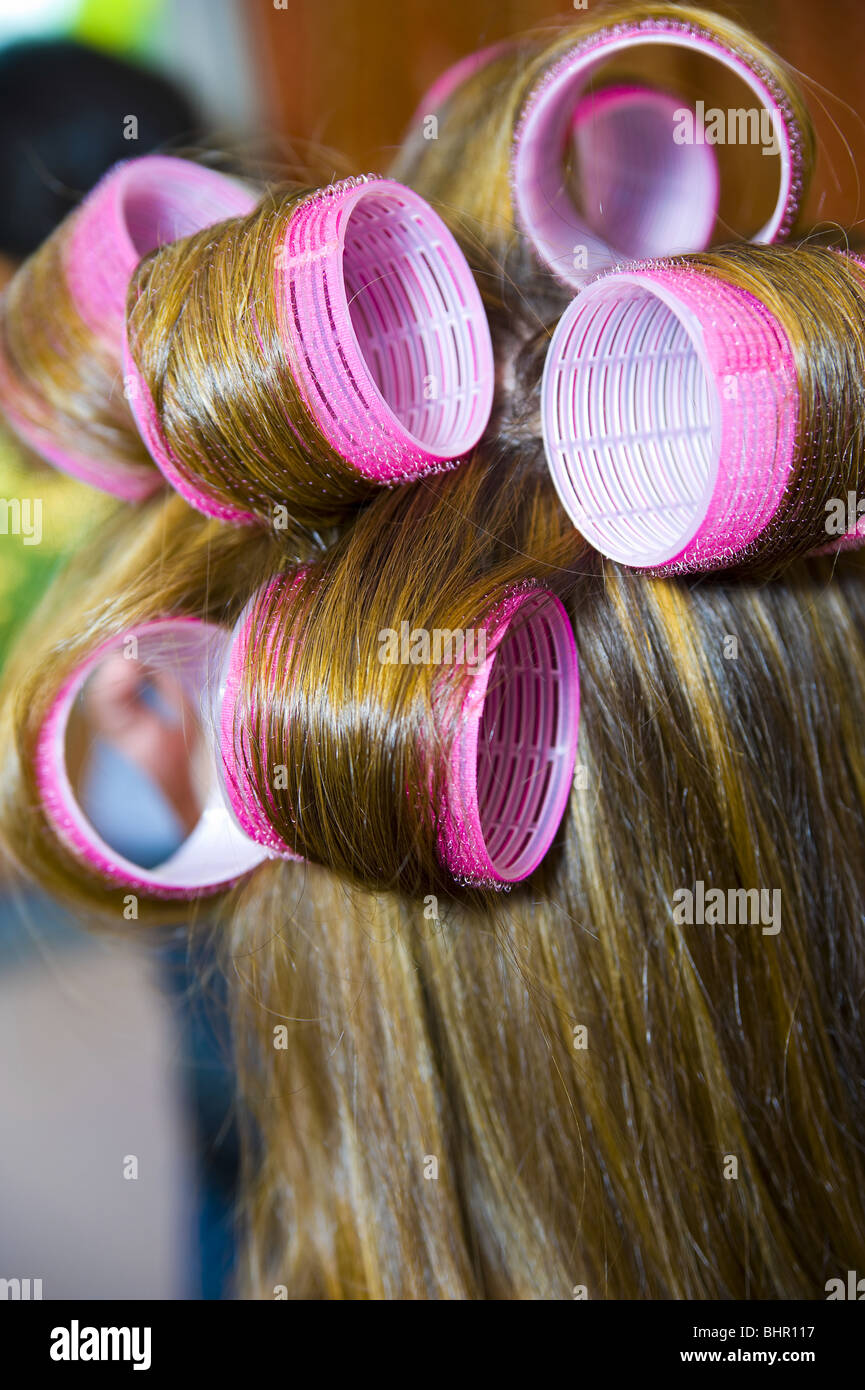 Woman's hair on curlers Stock Photo