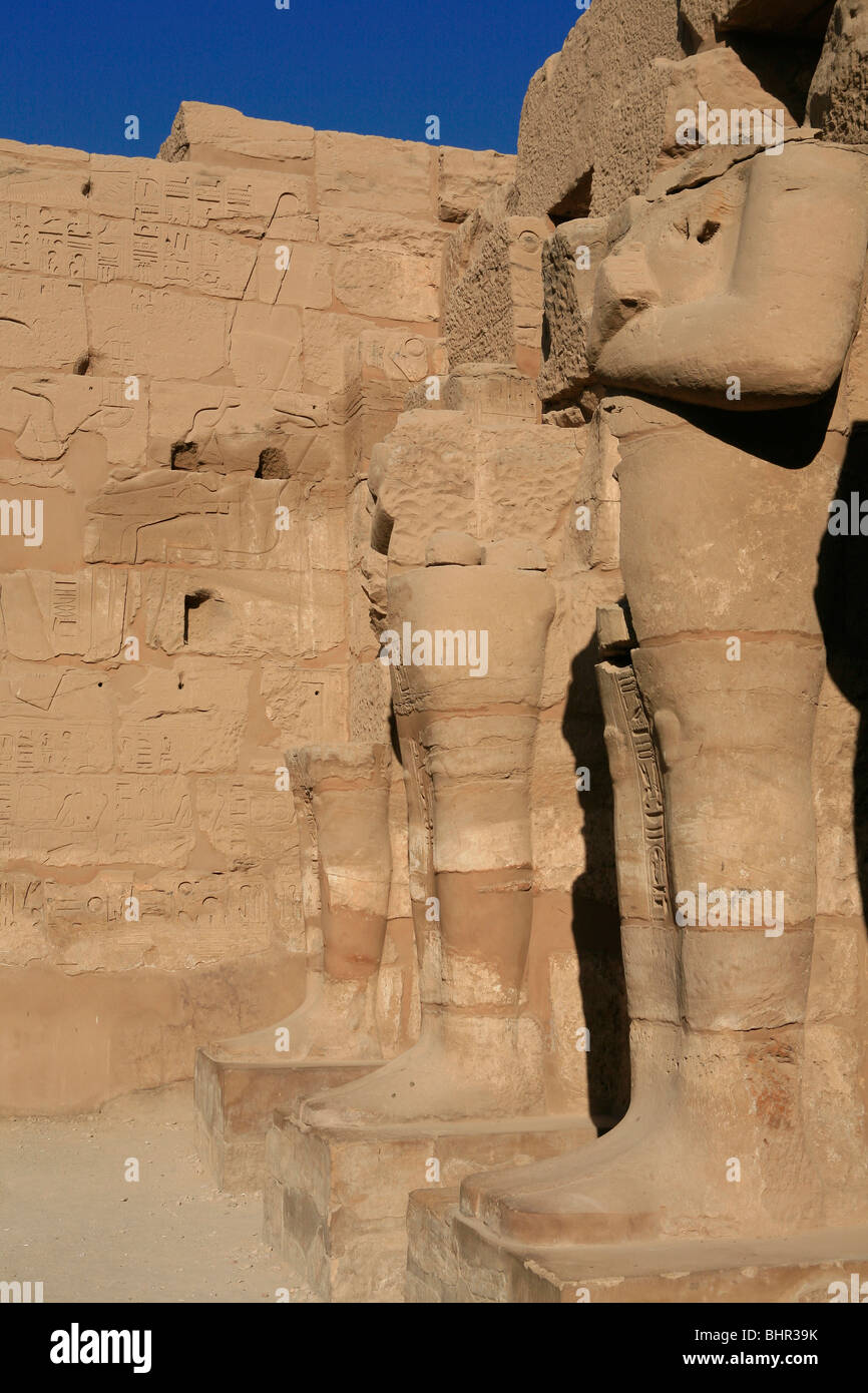 Osiride statues in the Temple of Ramesses III at the Temple of Karnak in Luxor, Egypt Stock Photo