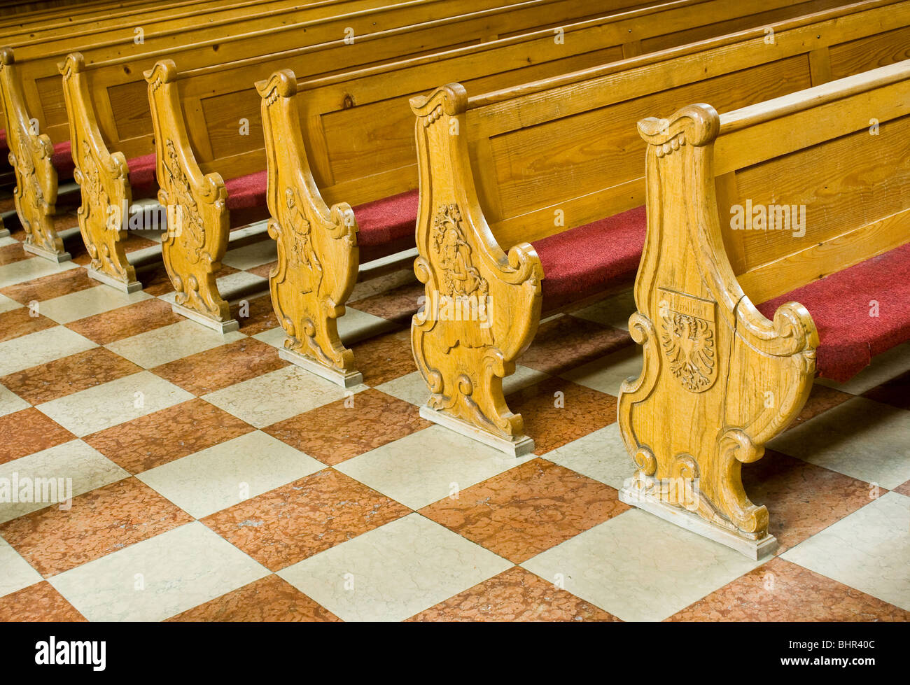 Wooden benches in a church Stock Photo Alamy