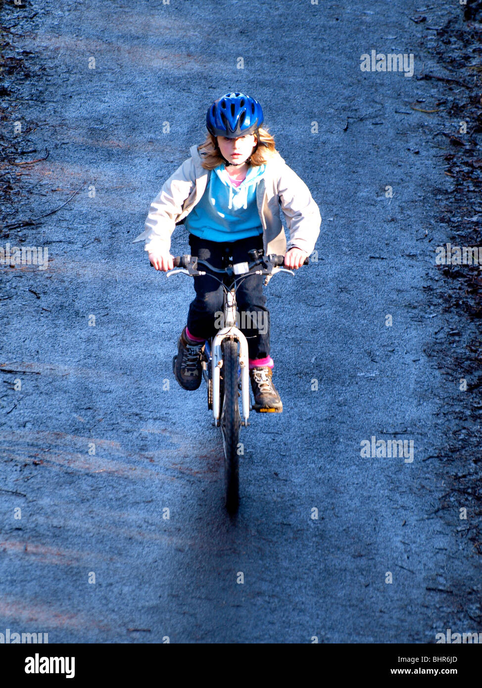 Young girl on bike Stock Photo Alamy