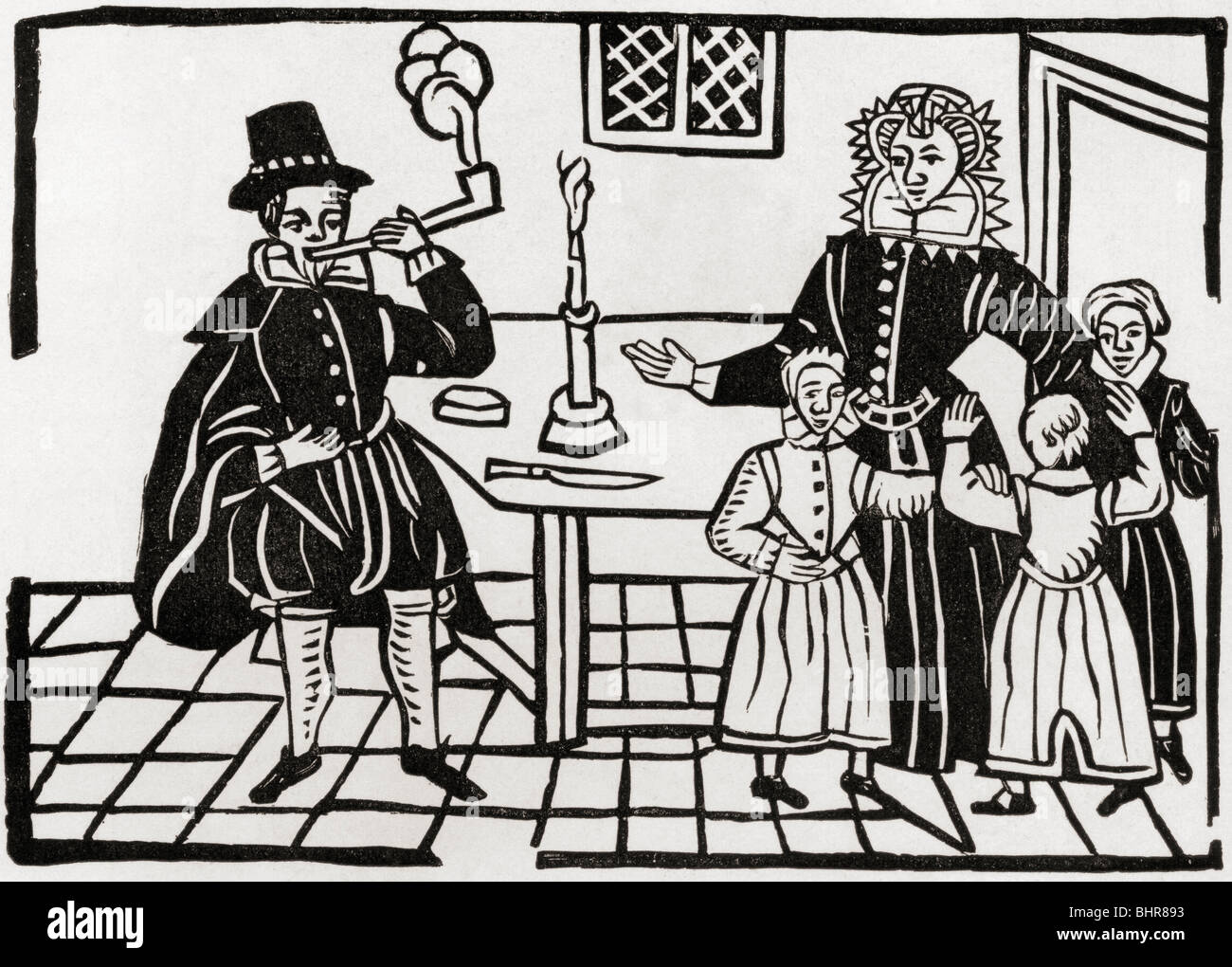 A family group during the reign of James I. Stock Photo