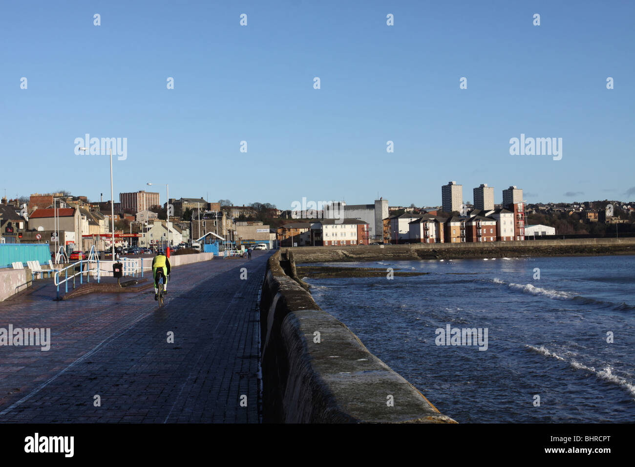 cyclist on esplanade Kirkcaldy Fife Scotland January 2010 Stock Photo