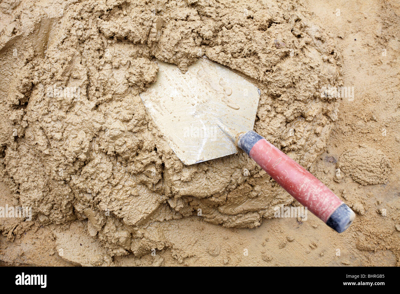 Wet Mixed Cement with Trowel detail Stock Photo