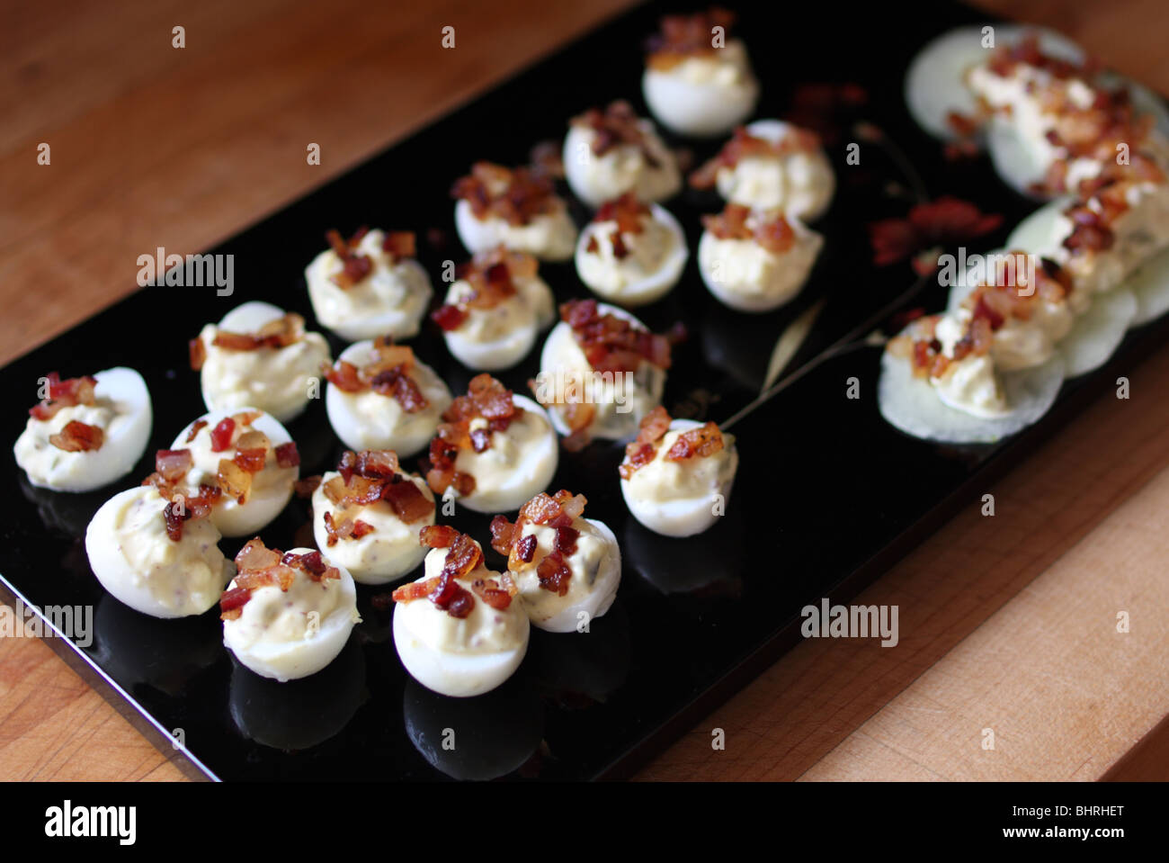 Deviled quail eggs with pancetta Stock Photo Alamy