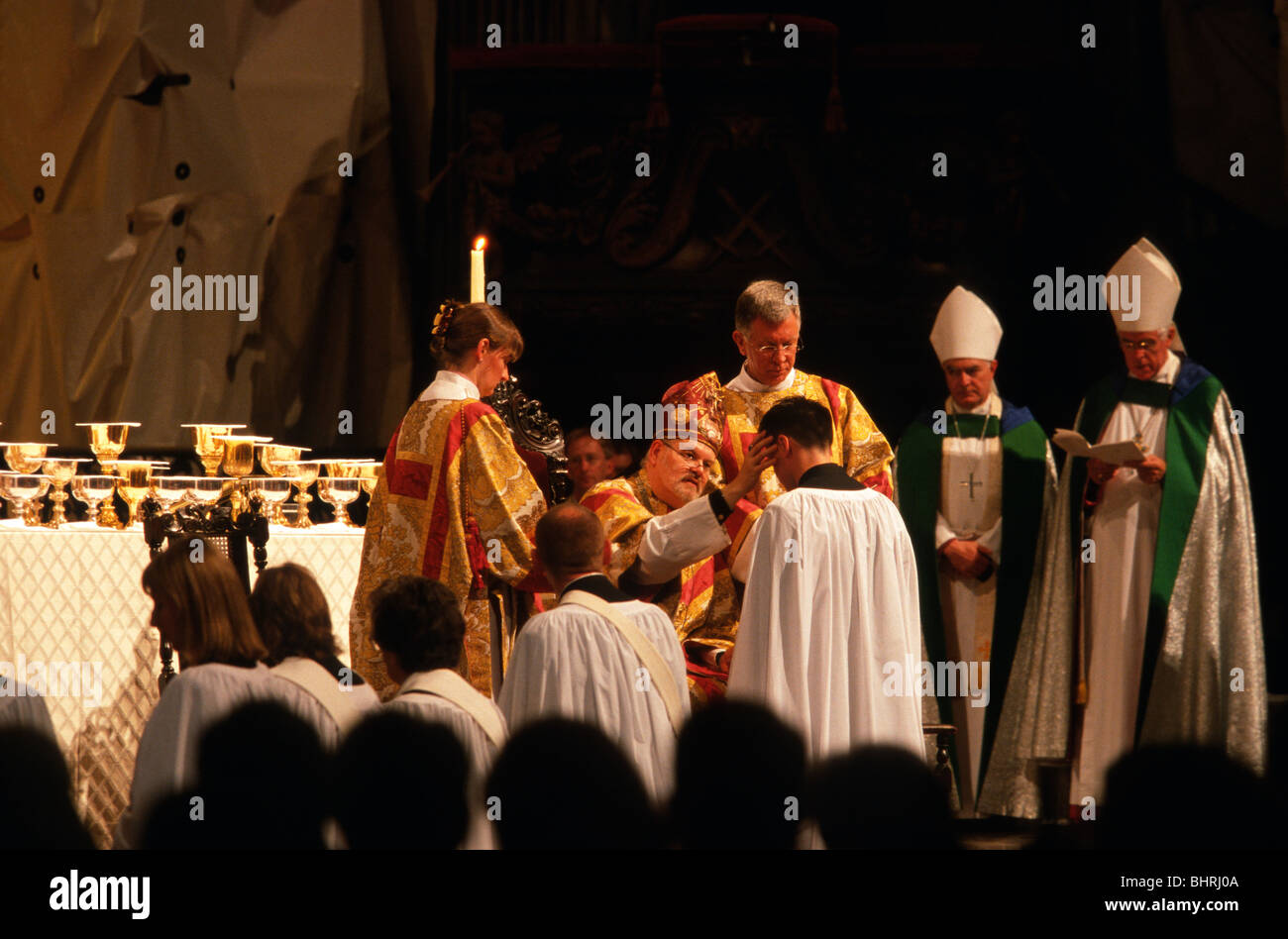 Ordination Of Deacons The Laying On Of Hands By The Bishop Of Stock Photo Alamy