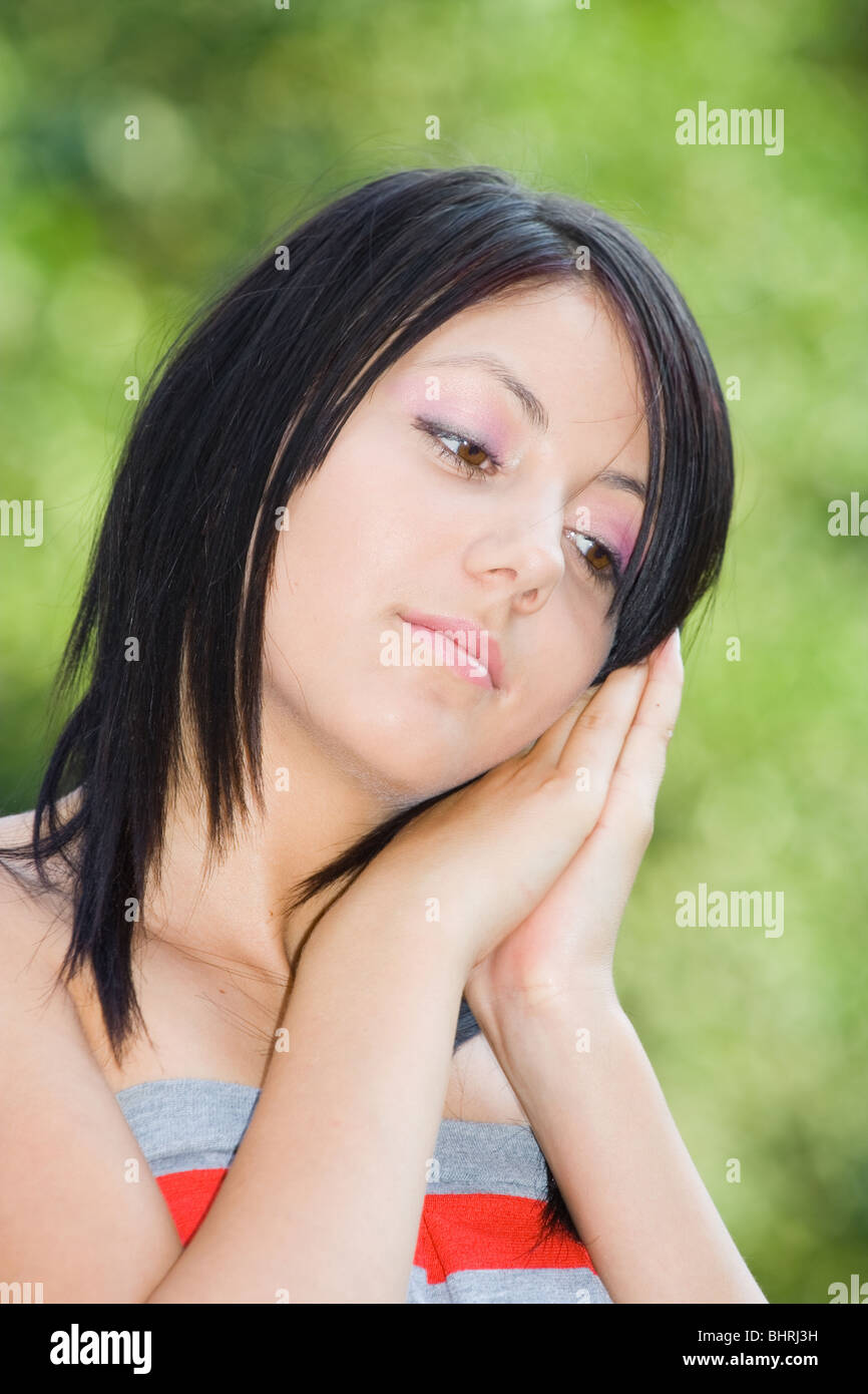 Pretty young woman having good time outdoors Stock Photo Alamy