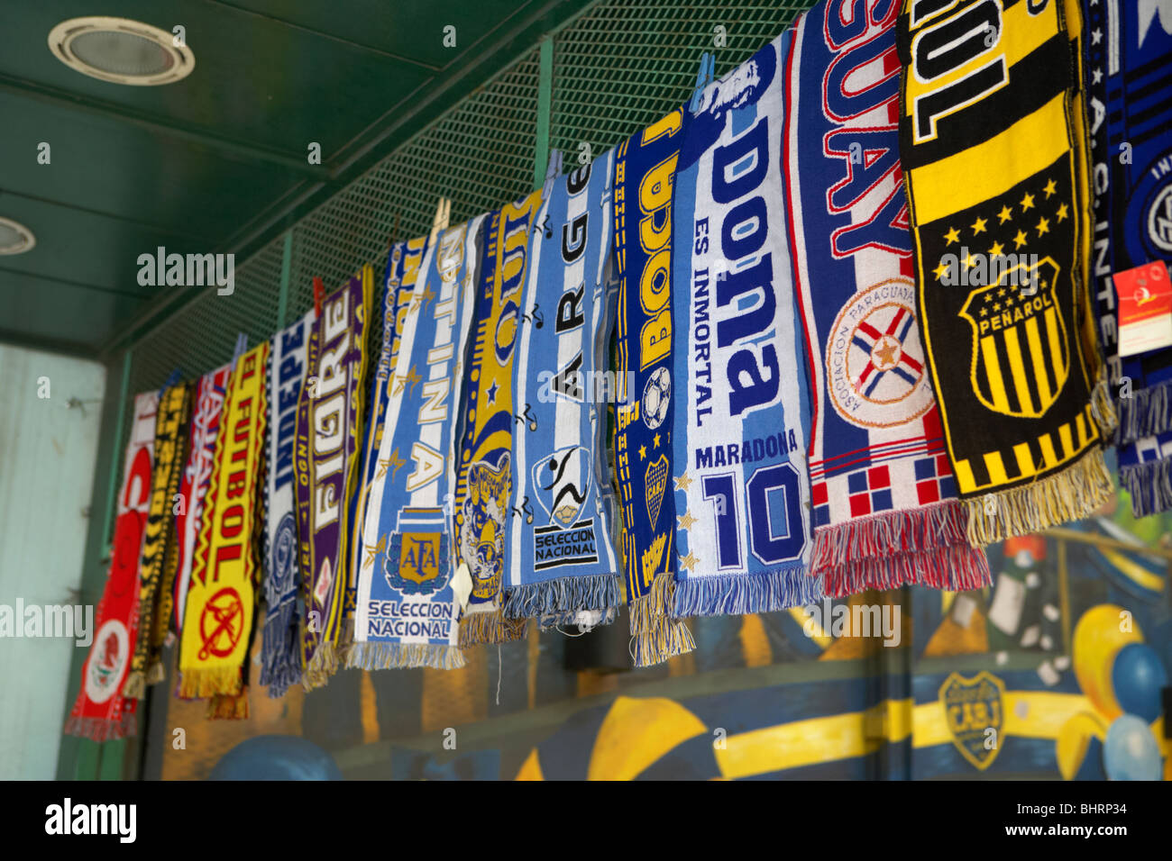 row of argentine football scarves hanging in a shop in la boca capital federal buenos aires republic of argentina south america Stock Photo