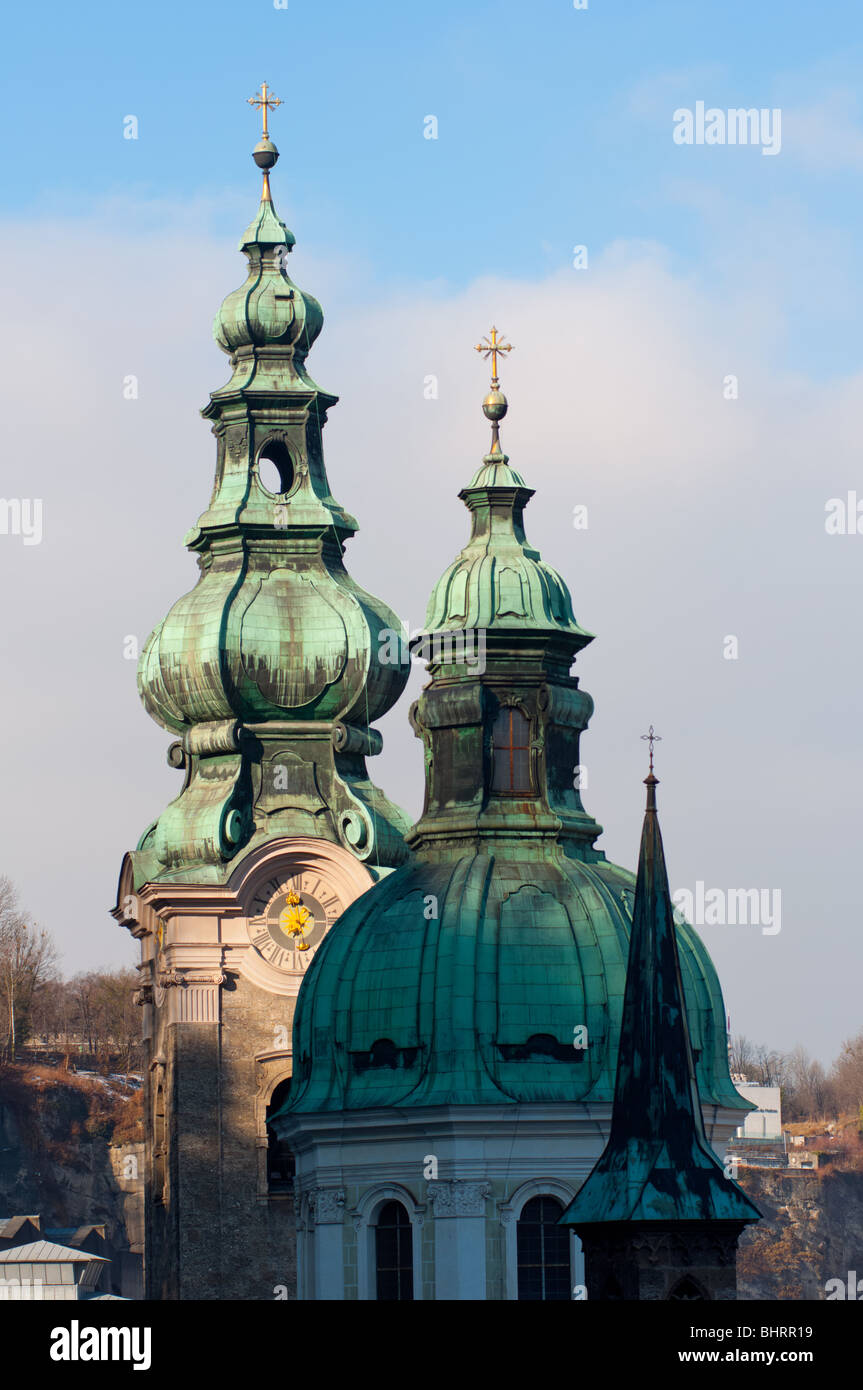 Three Salzburg church spires with the top spire belonging to Abbey Church of St. Peter, Austria. Stock Photo