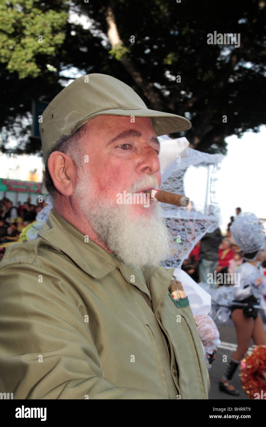 A man dressed as Fidel Castro as part of the Shrove Tuesday Carnaval parade in santa Cruz Tenerife Canary Islands Spain Stock Photo