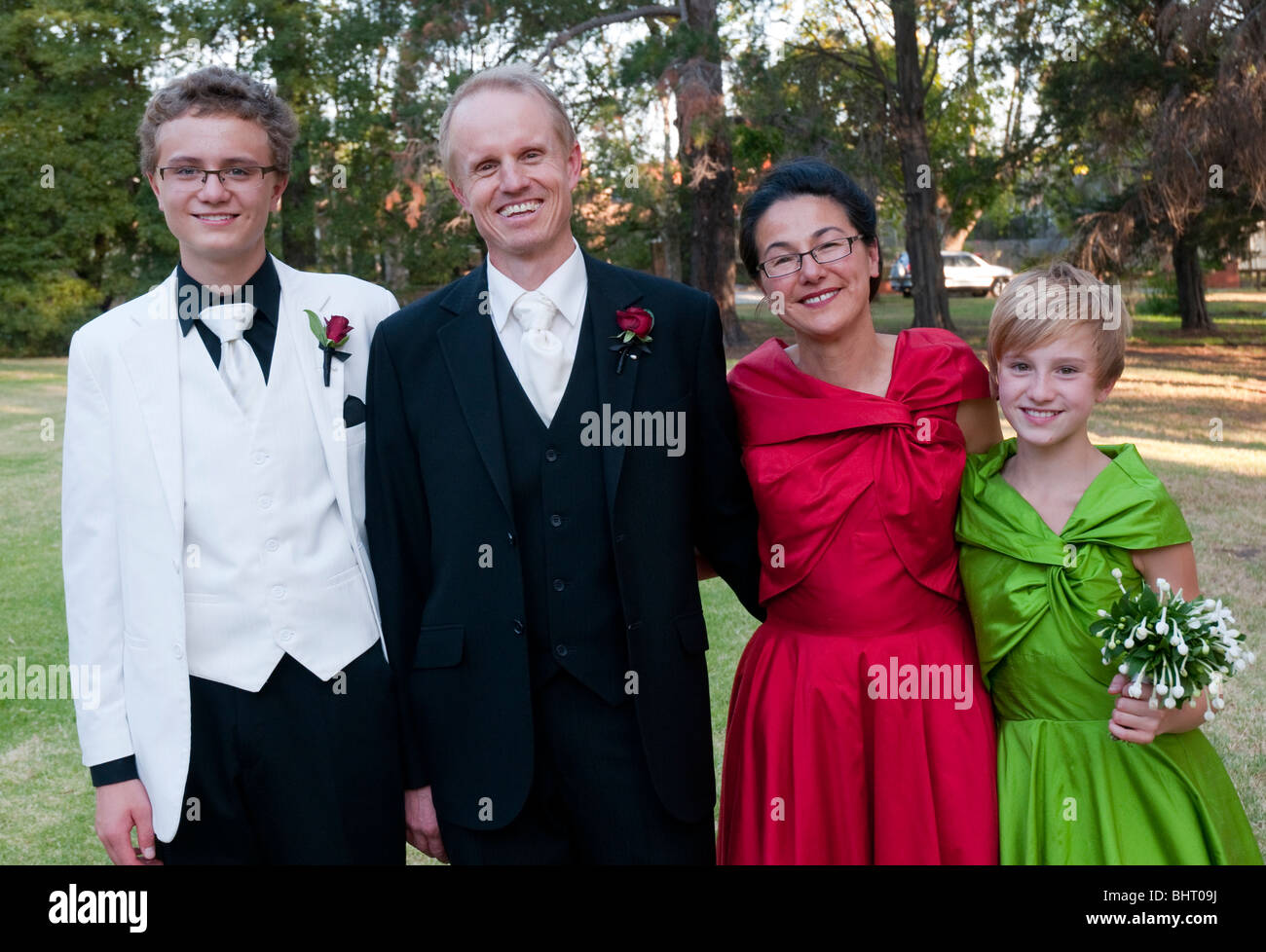 Family at a wedding bride groom and their children Stock Photo