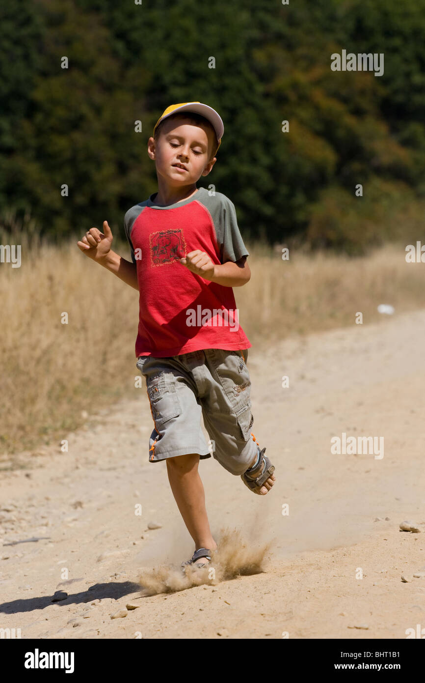 Seven year old boy running hires stock photography and images Alamy