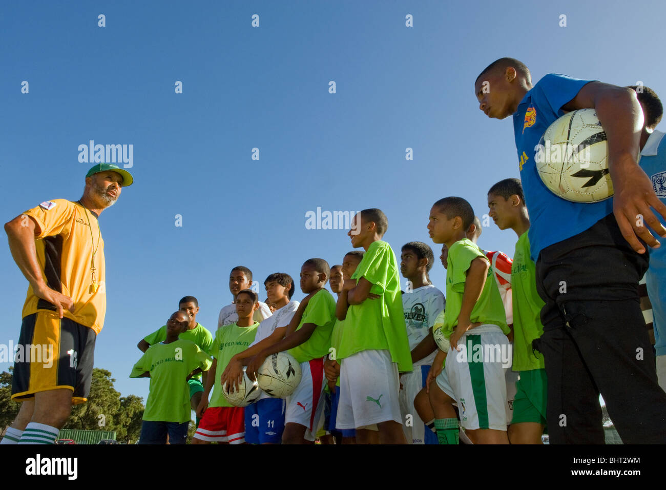 Coach instructing players at Old Mutual Football Academy, Cape Town, South Africa Stock Photo