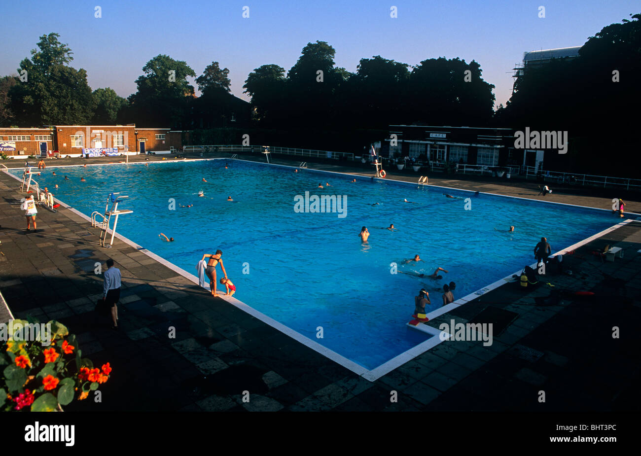 Early morning activity for south London locals as they swim in the unheated pool of Brockwell Lido, Herne Hill. Stock Photo