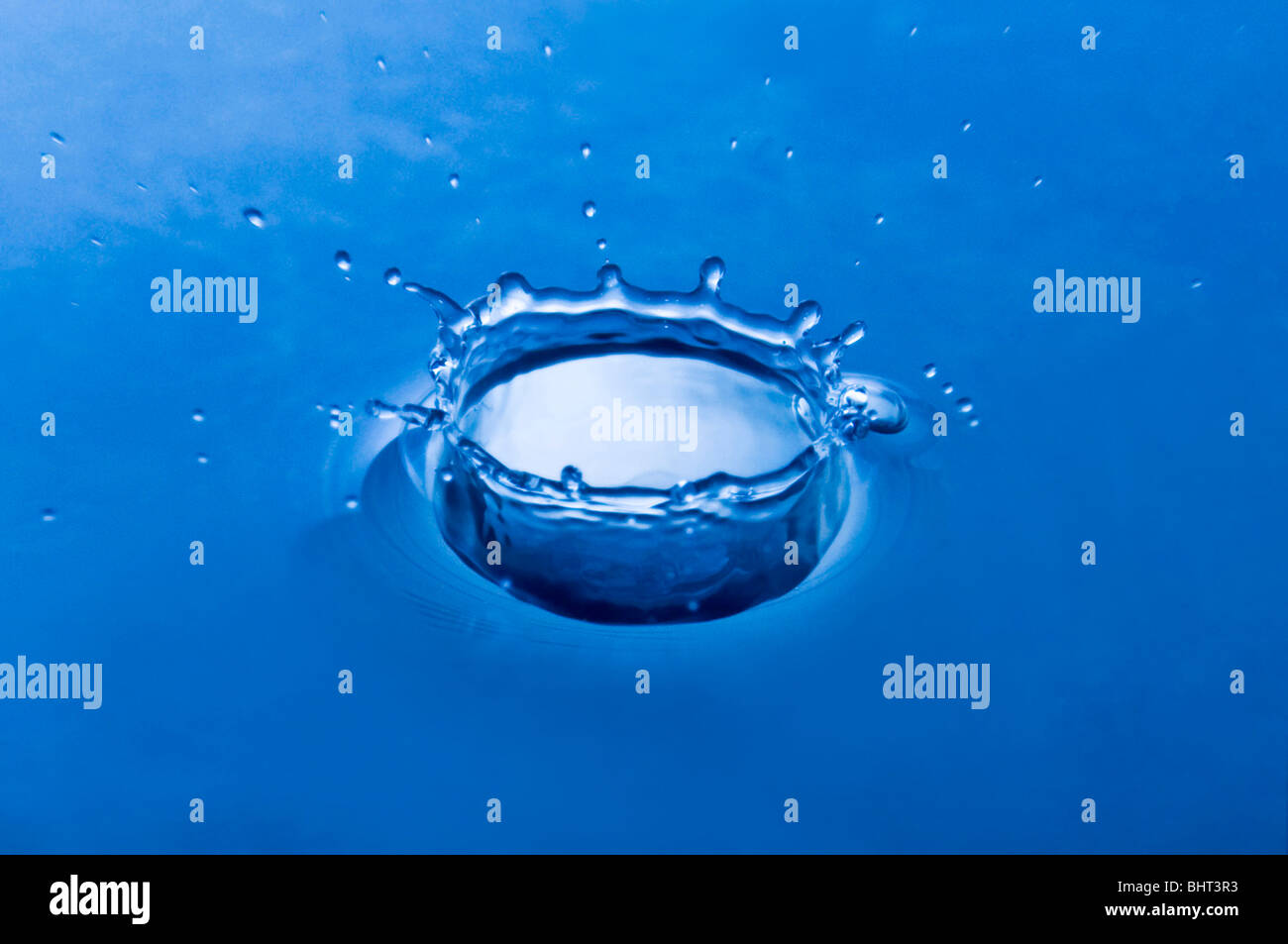 A drop of water hitting the surface Stock Photo Alamy
