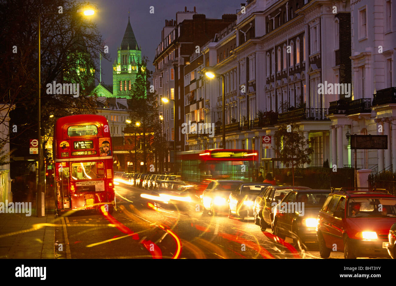 On Sydney Street, SW3, buses and busy traffic through the smart London
