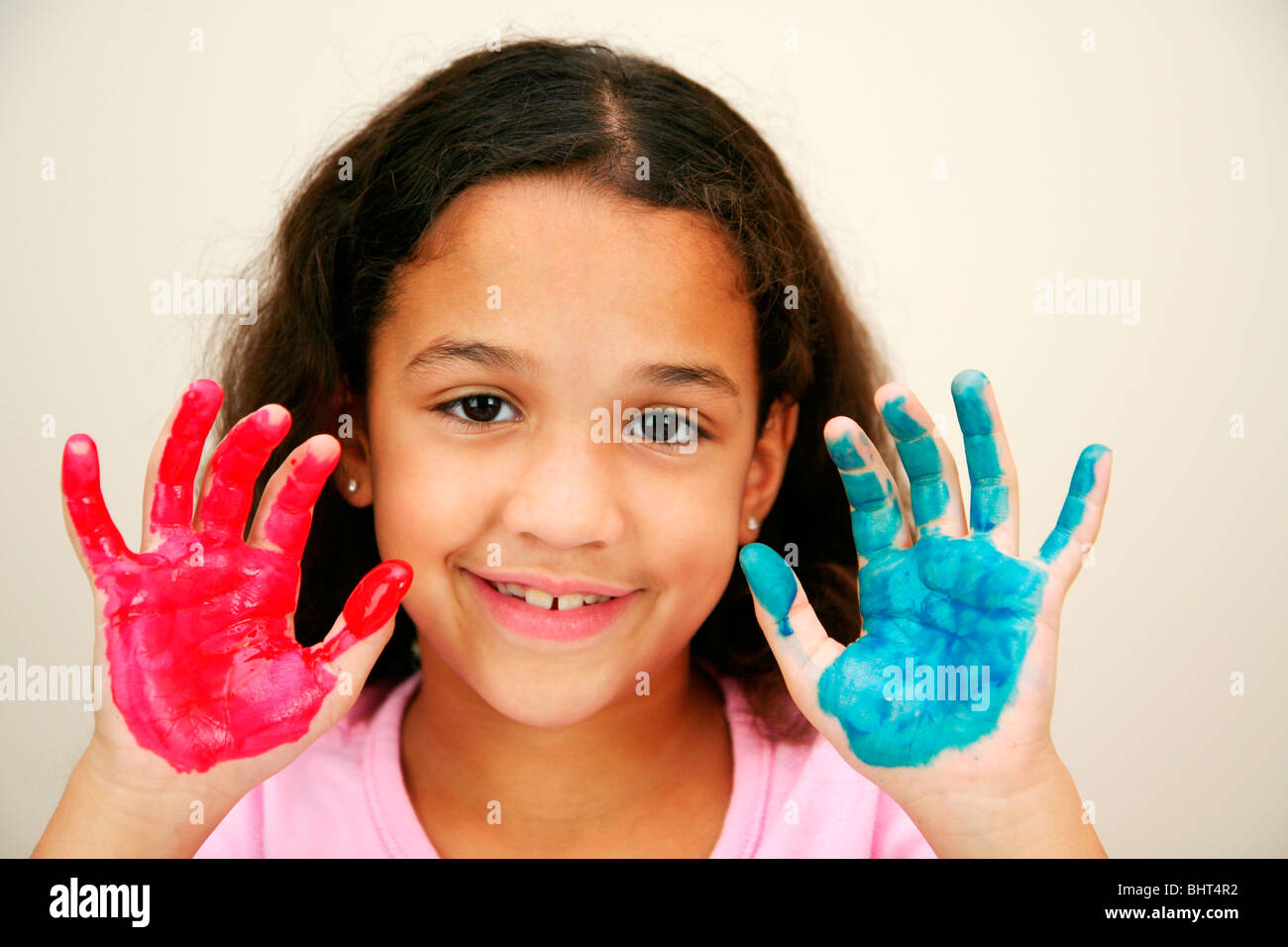 Girl at school finger painting Stock Photo Alamy