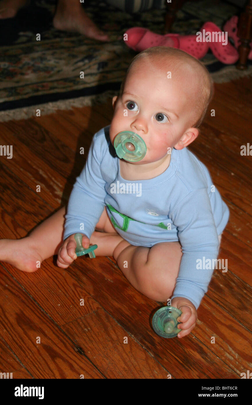 Spare pacifiers are good insurance against loss Stock Photo