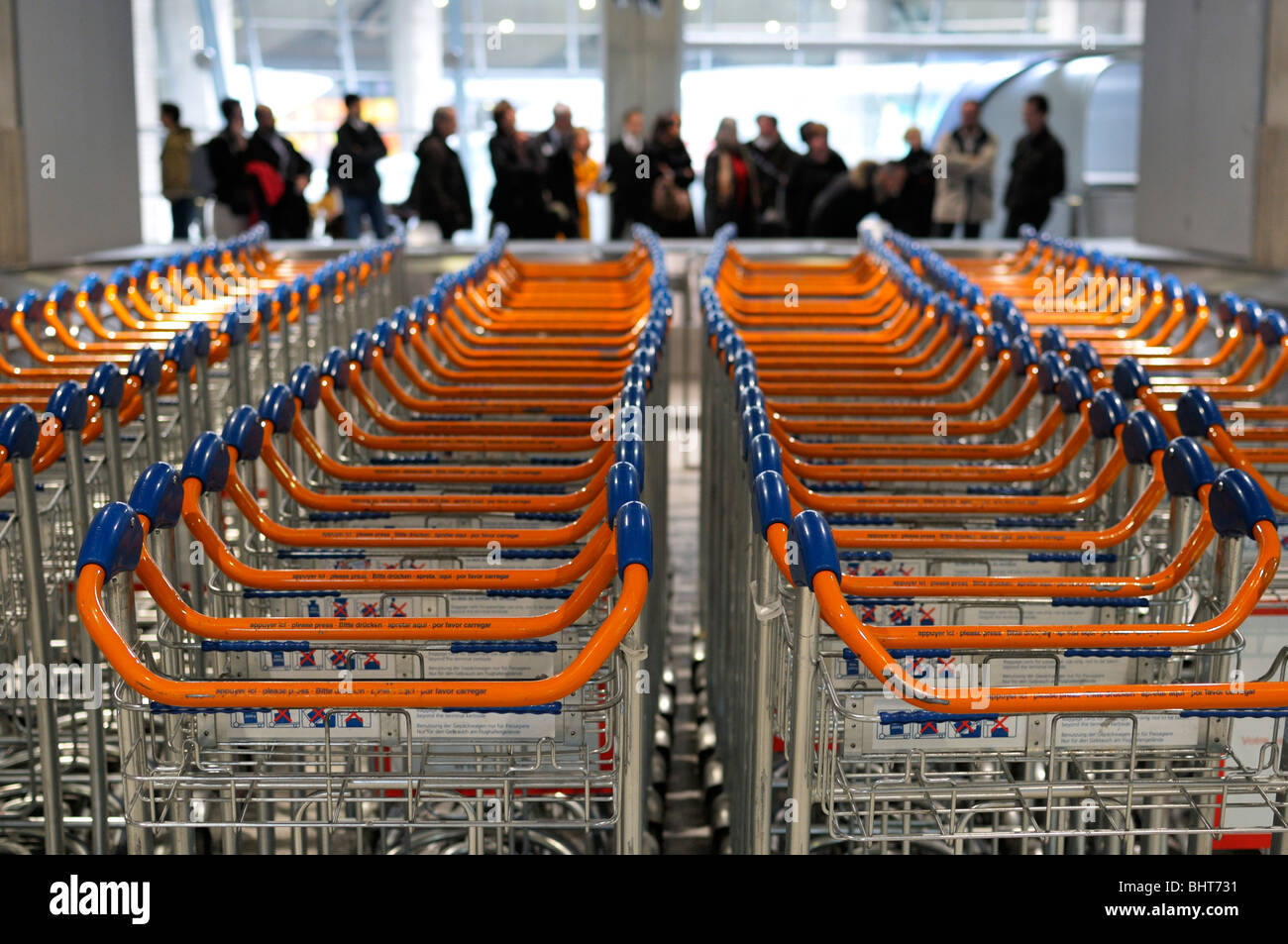 Passengers waiting for their luggage delivery, Paris CDG airport Stock