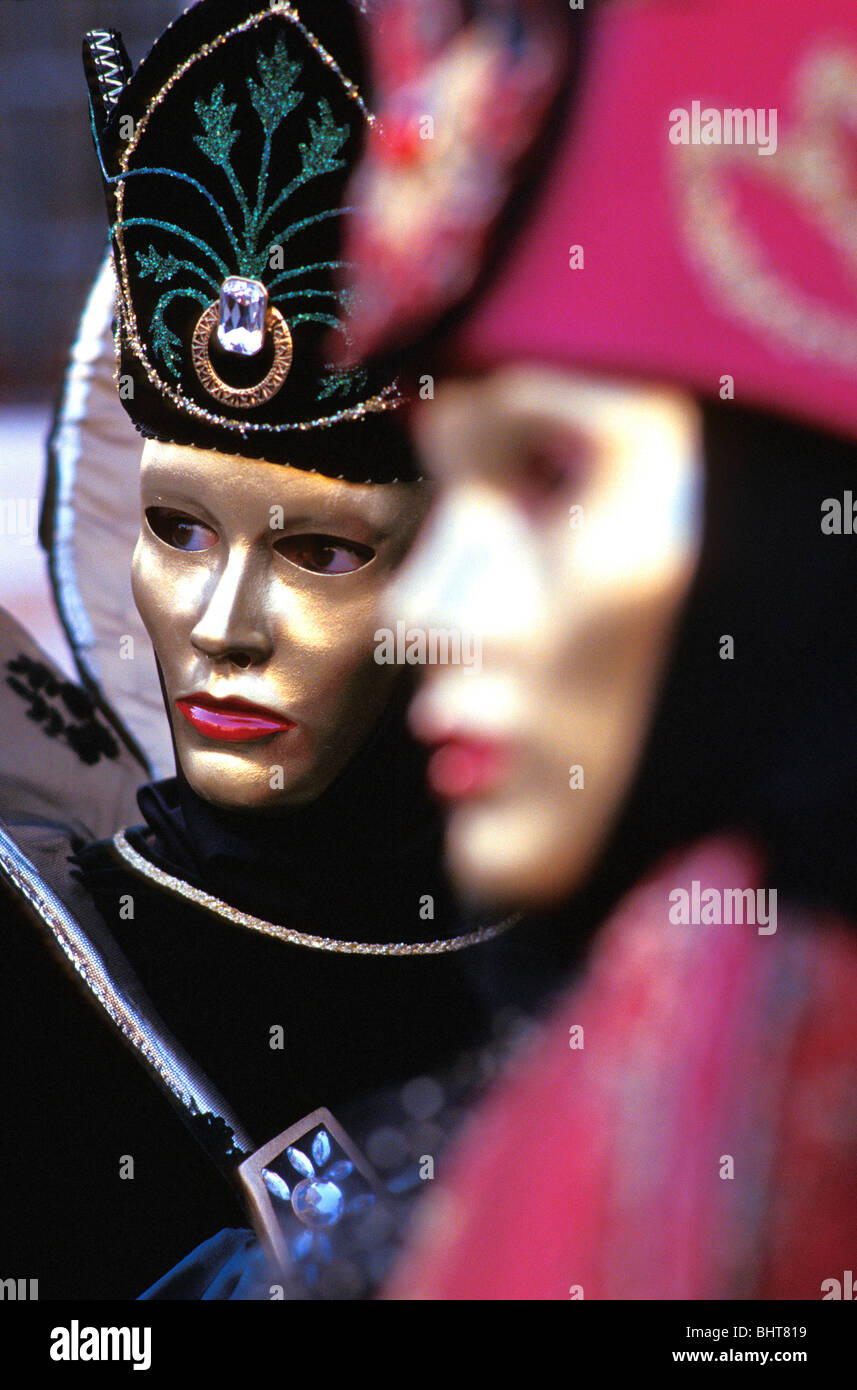 Gold with red lips mask & black costume & hat at the 1993 Venice