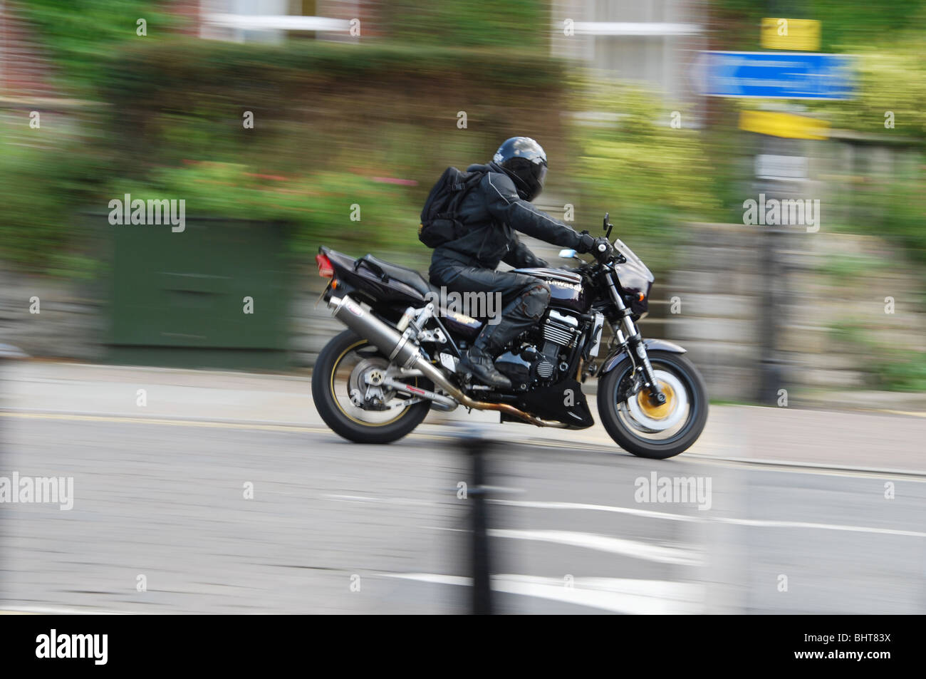 motorcycle passing Stock Photo