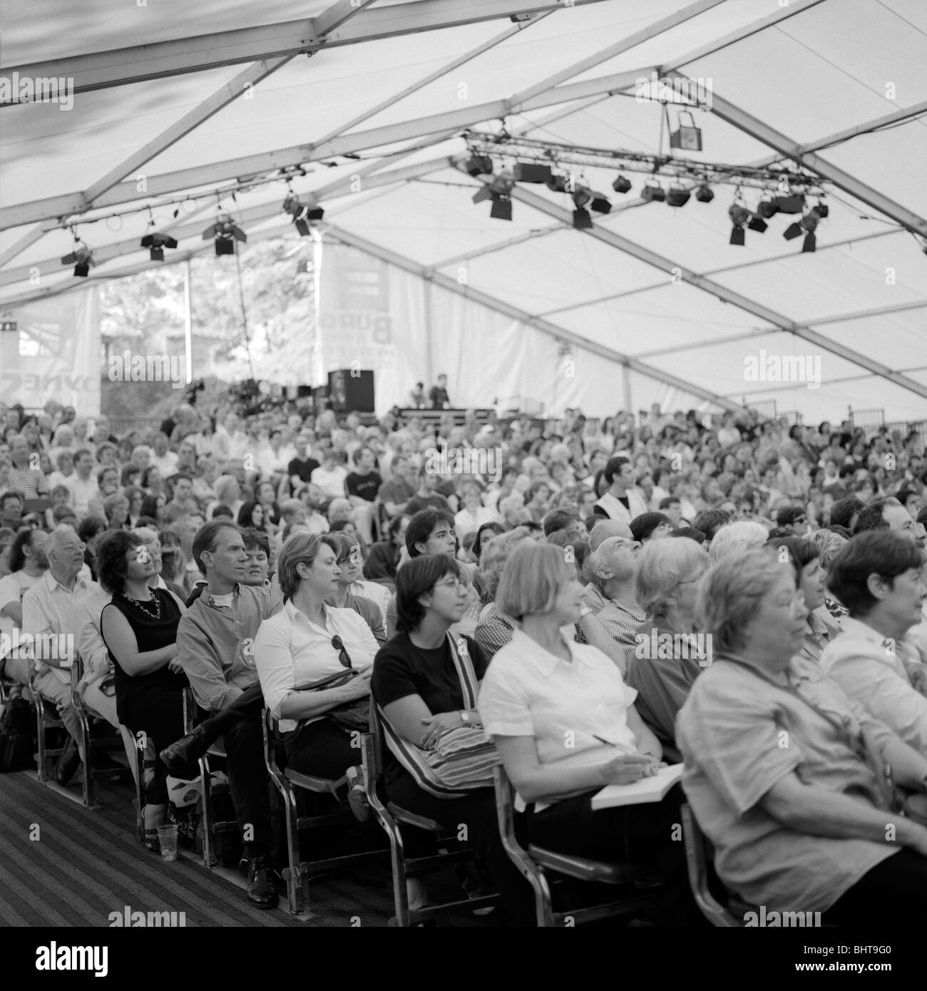 Seated audience listening to a talk at the Guardian Hay Festival, Hay-on-Wye, Wales UK Stock Photo
