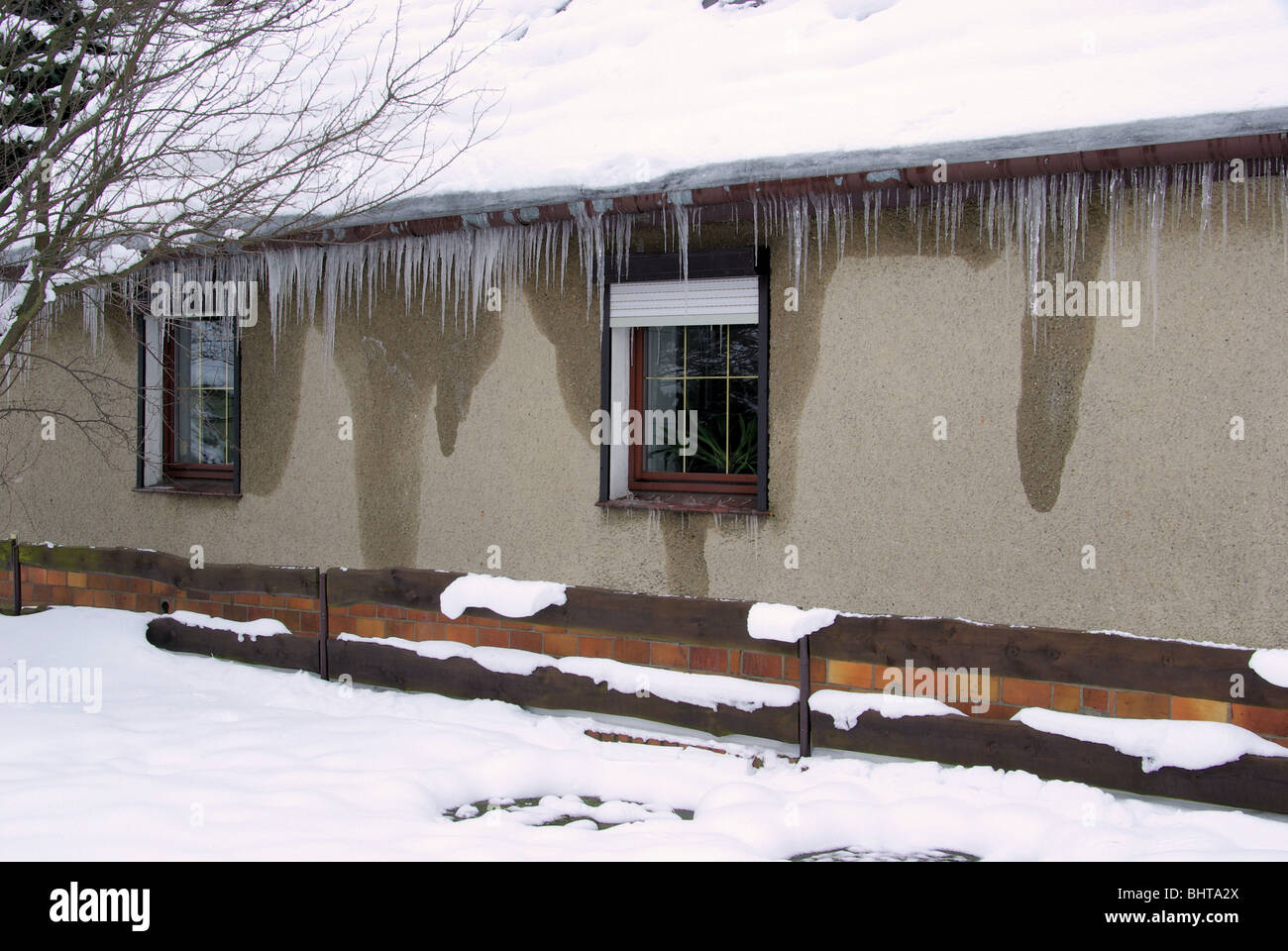 Eiszapfen am Haus - icicle on house 03 Stock Photo