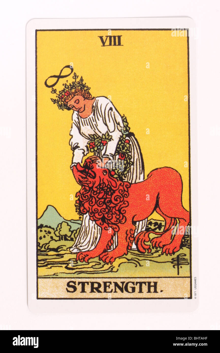 The Strength card from a traditional tarot pack. Stock Photo