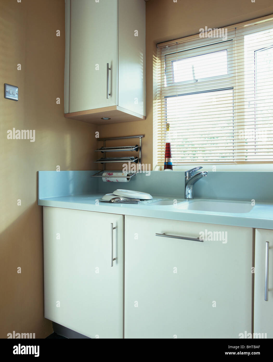 Pastel Blue Worktop On White Fitted Unit With Under Set Sink In Stock Photo Alamy