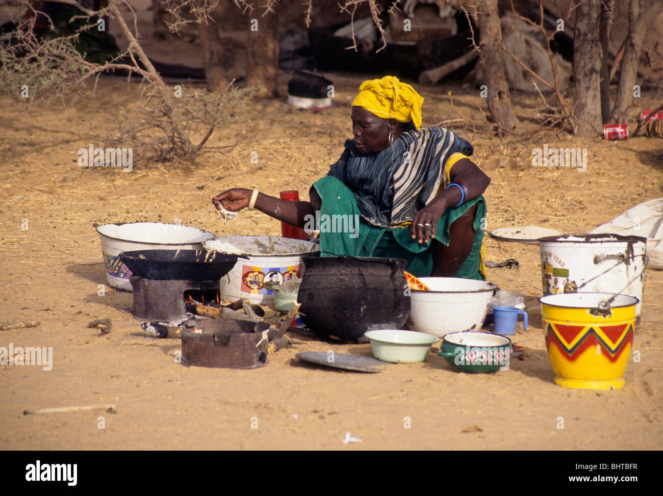 Akadaney, Central Niger, West Africa. Woman Preparing Food for Sale at Annual Fulani Gathering