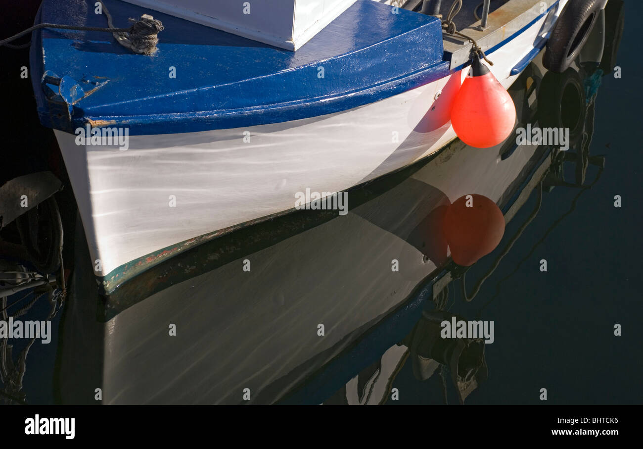 Reflection of fishing boat Stock Photo