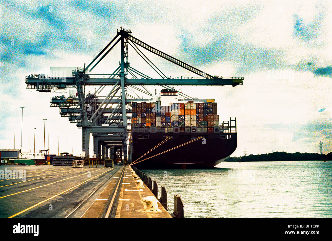 A moored cargo ship containing cargo Stock Photo