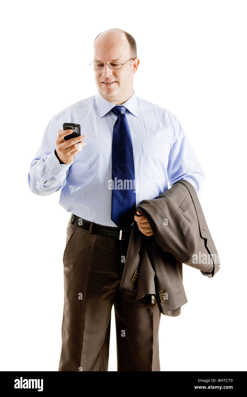 Middle-aged businessman sending a text message, isolated on white ...
