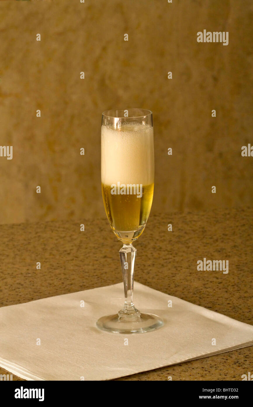 A glass of sparkling white wine Stock Photo Alamy