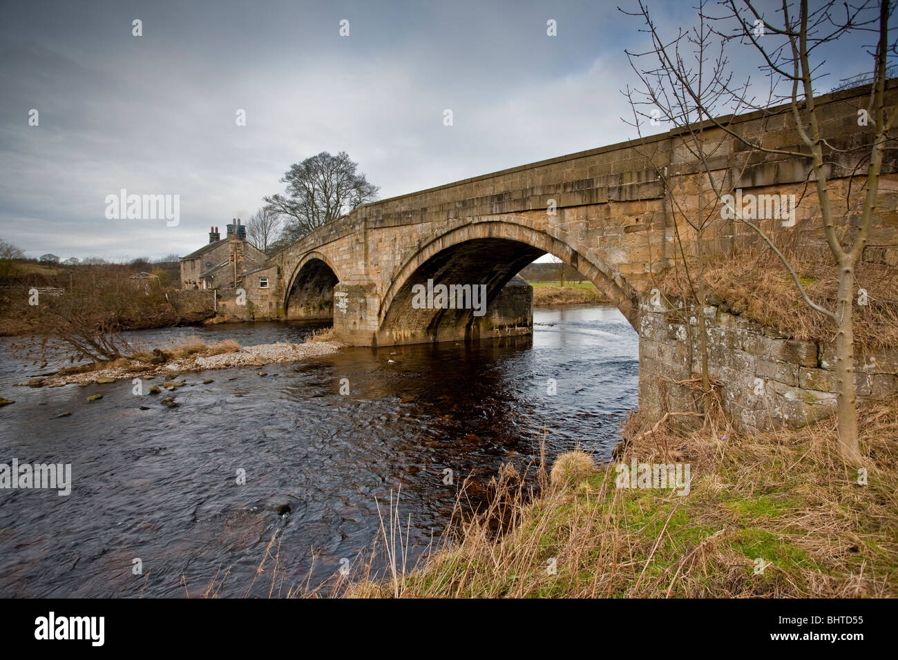 The old stone road bridge at Bolton Abbey Stock Photo